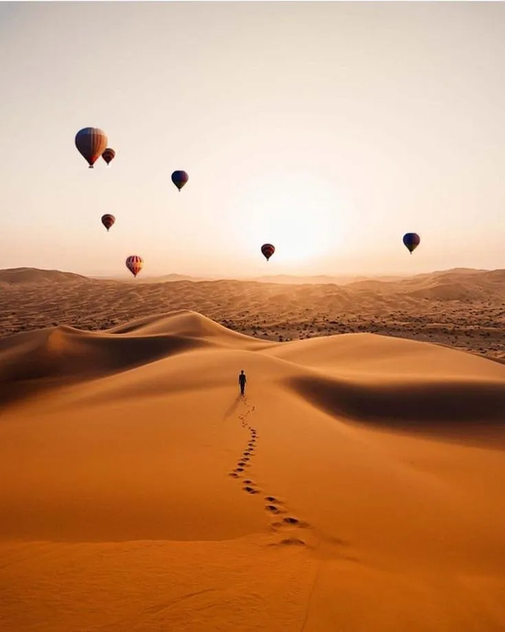 Hot air balloons over desert